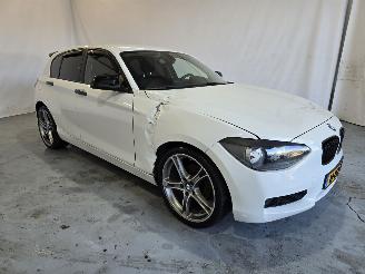 Schadeauto BMW 1-serie 114i EDE Business 2014/12