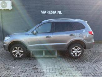 Salvage car Hyundai Santa Fe Santa Fe II (CM), SUV, 2006 / 2012 2.2 CRDi 16V 4x2 2012/9