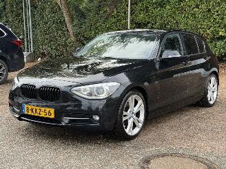 uszkodzony samochody osobowe BMW 1-serie 114i M Sport. 5 Deurs | Navi | Klima ( inruil verkregen ) 2013/5