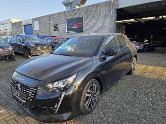 krockskadad bil auto Peugeot 208 1.2 Allure Automaat Led Camera Navi Drive-Mode 1/2Leder 74KW/100PK 2023/3