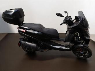 skadebil bromfiets Piaggio  MP3 2024/5