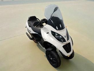 krockskadad bil bromfiets Piaggio  MP3 2010/10