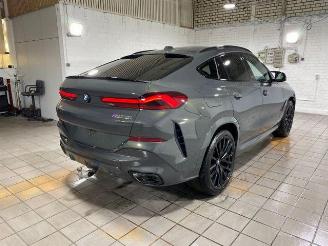 uszkodzony samochody osobowe BMW X6 M60i STANDHZG/PANO/HUD/AHK/360/B&W/NAVI 2025/10