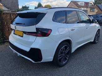 BMW iX1 E-DRIVE M-SPORT 67 KWH 296 PK PANO 350 CAMERA VOLL picture 1