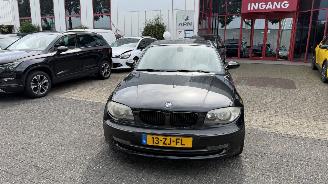 Damaged car BMW 1-serie REIHE 2.0 103 KW 2008/1