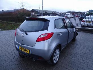 Vrakbiler auto Mazda 2 1.3 2011/9