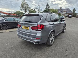 damaged passenger cars BMW X5 XDRIVE40E 2015/9