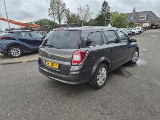Damaged car Opel Astra STATION WAGON 1.7 CDTi 2009/1