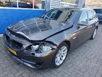 Vaurioauto  passenger cars BMW 5-serie 520i automaat Upgrade Edition 2012/10