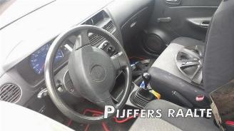 Daihatsu Cuore Cuore (L251/271/276), Hatchback, 2003 1.0 12V DVVT picture 8