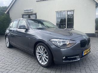 Damaged car BMW 1-serie 116d High Executive AUTOMAAT 2013/1