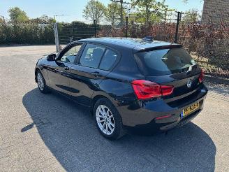 skadebil auto BMW 1-serie 118i Executive automaat Nap 2017/6