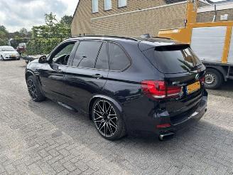 Damaged car BMW X5 xDrive40e iPerformance High Exec M-Pakket 2015/12