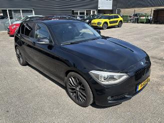 Schadeauto BMW 1-serie 116i  5-drs  High Exe. 2013/12
