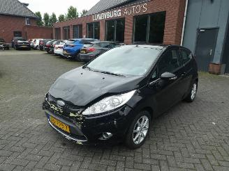 uszkodzony samochody osobowe Ford Fiesta 1.4 Ghia Airco 2009/9