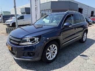 Vaurioauto  passenger cars Volkswagen Tiguan 1.4 TSI AUTOMAAT Panoramadak Sport&Style 2014/12