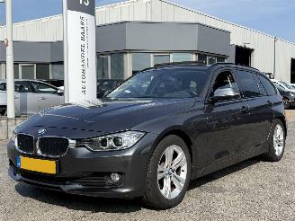 Schadeauto BMW 3-serie Touring 320d High Executive AUTOMAAT 2013/1