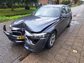Vaurioauto  passenger cars BMW 3-serie 316i touring automaat 2014/8