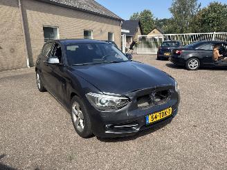 Damaged car BMW 1-serie 116i Business+ REST BPM €300,-!!! 2012/1