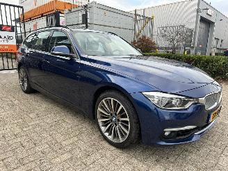 Schadeauto BMW 3-serie 318i Luxury Edition 2018/11