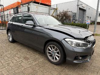krockskadad bil auto BMW 1-serie 118i High Executive Automaat 2019/1