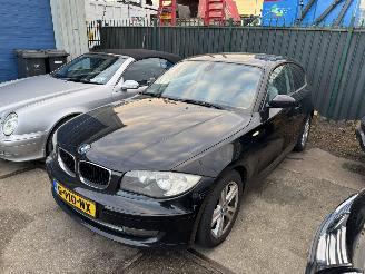 skadebil auto BMW 1-serie 116i 90KW AIRCO 2009/1