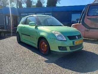 uszkodzony samochody osobowe Suzuki Swift 1.3 Exclusive 2009/9