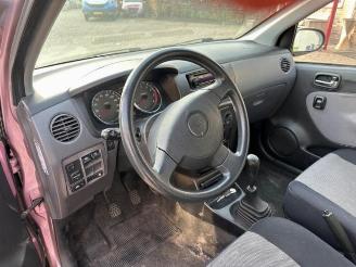 Daihatsu Cuore Cuore (L251/271/276), Hatchback, 2003 1.0 12V DVVT picture 4