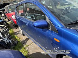 Daihatsu Cuore Cuore (L251/271/276), Hatchback, 2003 1.0 12V DVVT picture 9