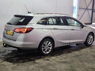 krockskadad bil auto Opel Astra 1.0 Turbo 12V Combi/o  Benzine 999cc 77kW (105pk) FWD 2019/6