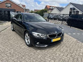 skadebil auto BMW 4-serie 418i Centennial High Executive | 98.308 km!! 2017/2