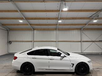 uszkodzony samochody osobowe BMW 4-serie 418i 100kW Automaat Centennial High Executive 2017/1