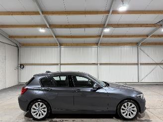 skadebil auto BMW 1-serie 120i 135kW Automaat High Executive 2019/2