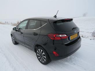 Damaged car Ford Fiesta 1.0 130pk Hybride 21.000km Benzine/ Elektrisch Camera Navigatie Stoelverwarmd en stuur 2023/10