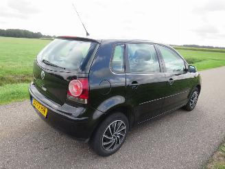 damaged passenger cars Volkswagen Polo 1.2 Optive 5drs Airco  2007  Parkeerschade NAVIGATIE 2007/9