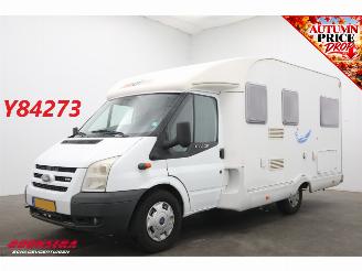 skadebil camper CI  Caroica 595 P 2.2 TDCI Middenkeuken Treinzit Lengtebed Cruise Camera Airco 2008/7