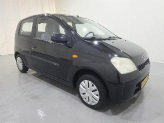 uszkodzony samochody osobowe Daihatsu Cuore 1.0 12V AUT 3.Drs 2003/5