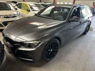 Schadeauto BMW 3-serie 320i  Automaat Touring  M Pakket 2019/4