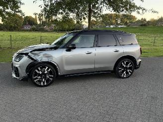 Schadeauto Mini Countryman C John Cooper Works / Leer / Panorama / Automaat 2024/5