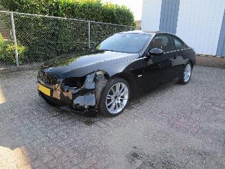 Damaged car BMW 3-serie 320i Coupe Leder Navi  Clima 2008/9