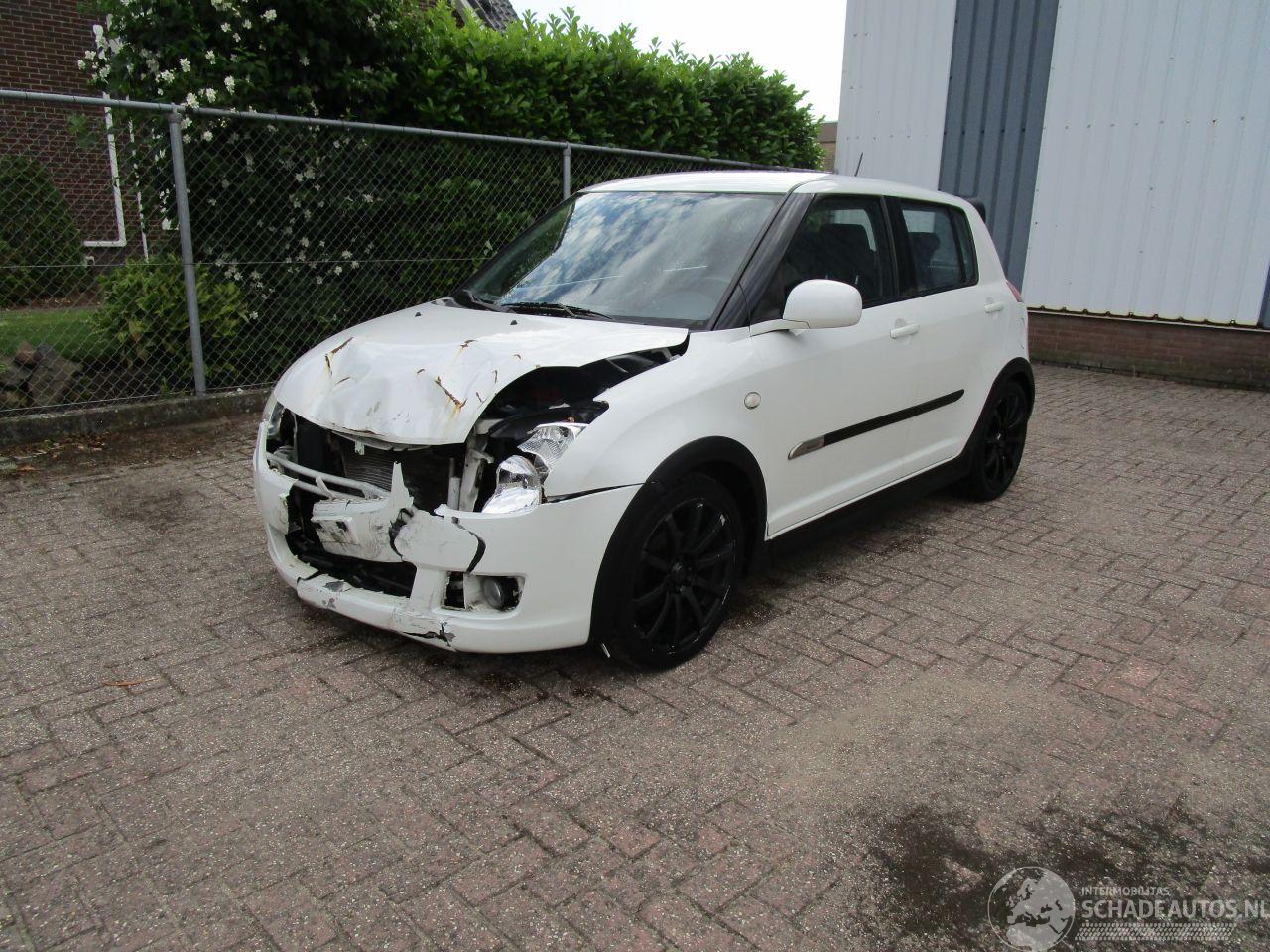 Suzuki Swift 1.3 Airco Radio/CD Parelmoer Wit