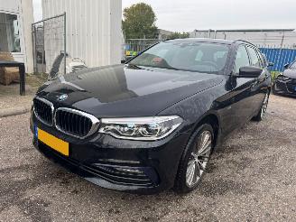 Schadeauto BMW 5-serie Touring 520i AUTOMAAT High Executive 2017/9