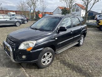 skadebil auto Kia Sportage 2.0  CVVT  X-Ecutive 2009/1