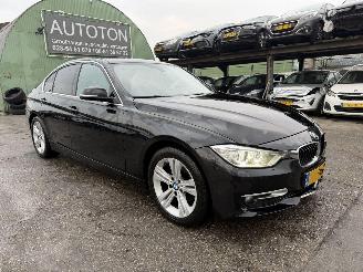 Damaged car BMW 3-serie 320i 125KW Clima Navi Leer Led Xenon High Executive NAP 2013/1