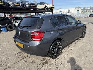Schadeauto BMW 1-serie 116i Autom. 100KW Clima Navi 5-Drs 2012/2