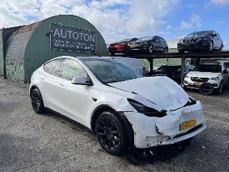 Schadeauto Tesla Model Y 58 kWH 175 KW RWD NAP 2023/11