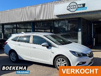 skadebil auto Opel Astra Sports Tourer 1.6 CDTI Business+ Navigatie Cruise PDC 2017/1