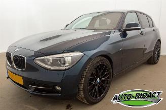 Damaged car BMW 1-serie 114i Navi Airco Stoelverwarming Leder Upgrade Edition 2013/3