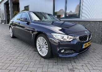 Damaged car BMW 4-serie 420i Luxury Gran Coupe 2015/10