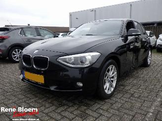 skadebil auto BMW 1-serie 116i High Executive Automaat 2013/8